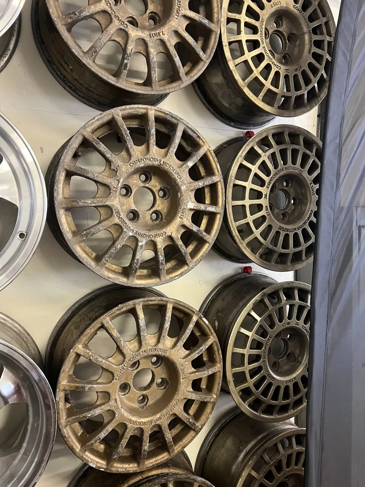 Collection of wheels with a metallic finish on a white background