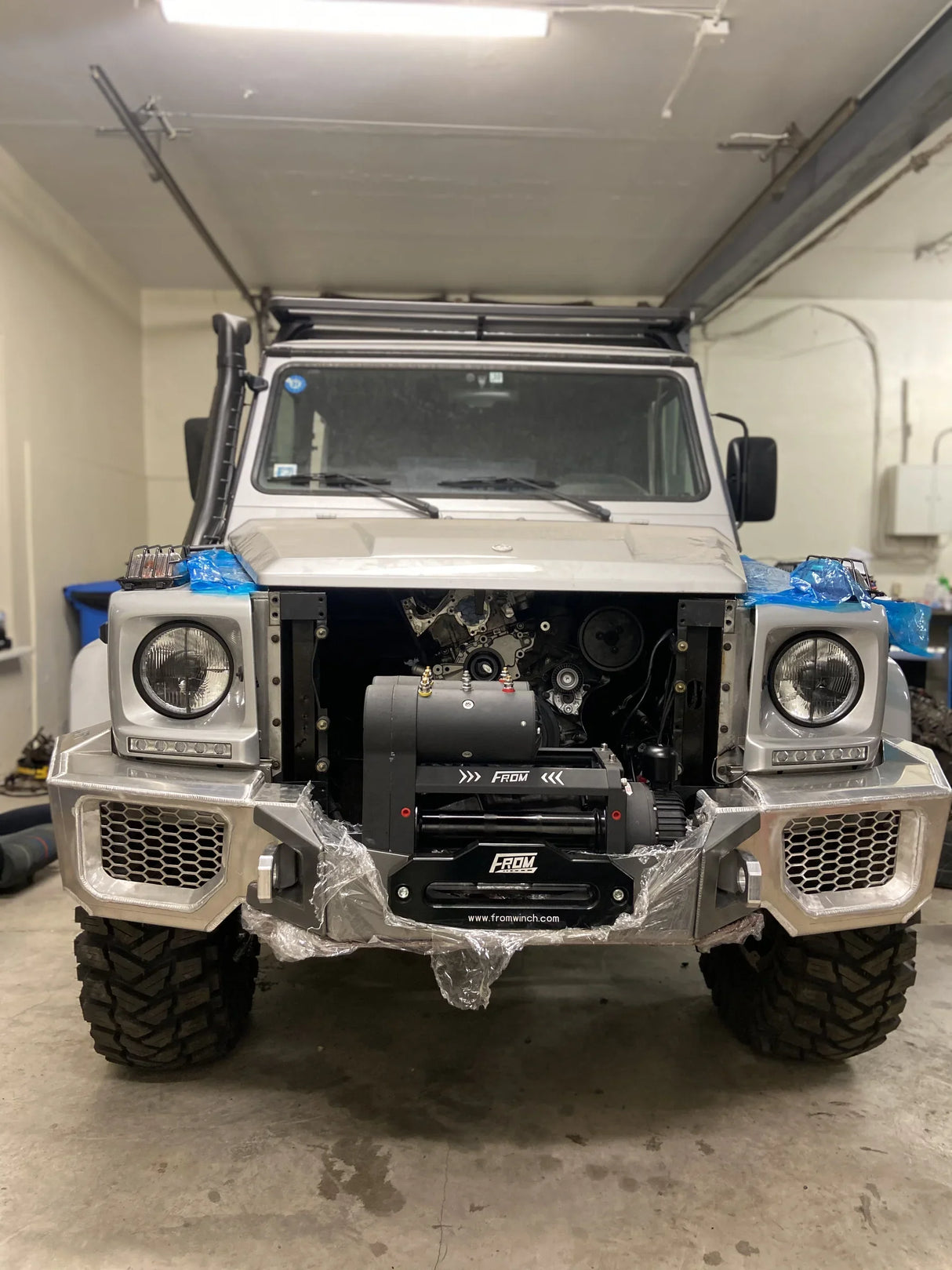 Overland-G aluminum front bumper test fit on Mercedes-Benz G-Class in raw aluminum finish