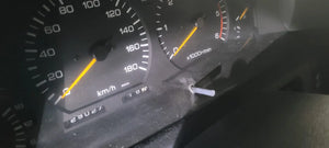 Nissan Patrol Y60 odometer close-up gauge cluster