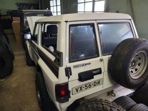Nissan Patrol Y60 rear side second angle exterior photo