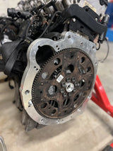Close-up of a mechanical engine component on a blurred background