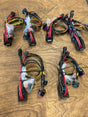 Set of electronic wiring harnesses on a wooden surface