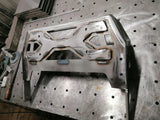 Full view of Overland-G front bumper winch mount structure during fabrication