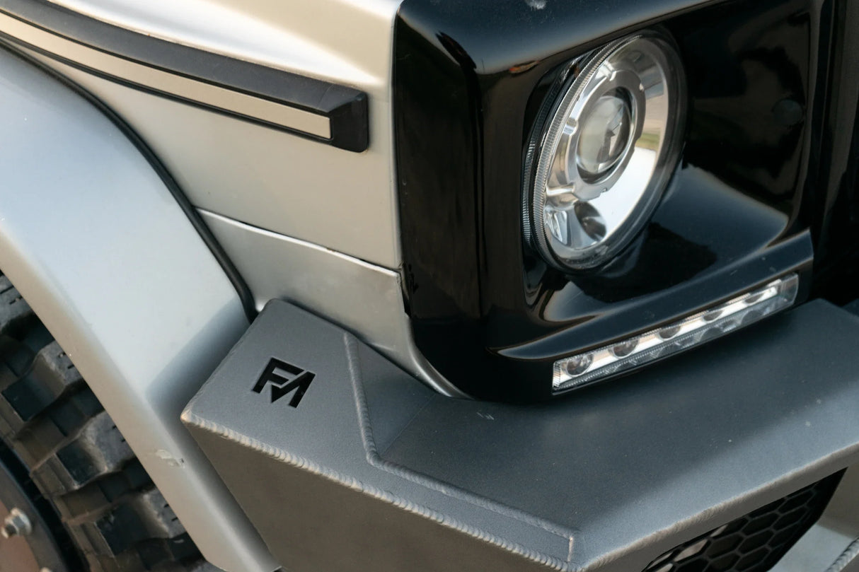 Overland-G branding detail on aluminum front bumper