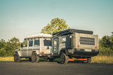 Overland-G aluminum rear bumper on G-Class with Tralis trailer at Abenteuer Allrad expo