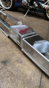 Side profile of Overland-G aluminum rear bumper during fabrication showing depth and structure