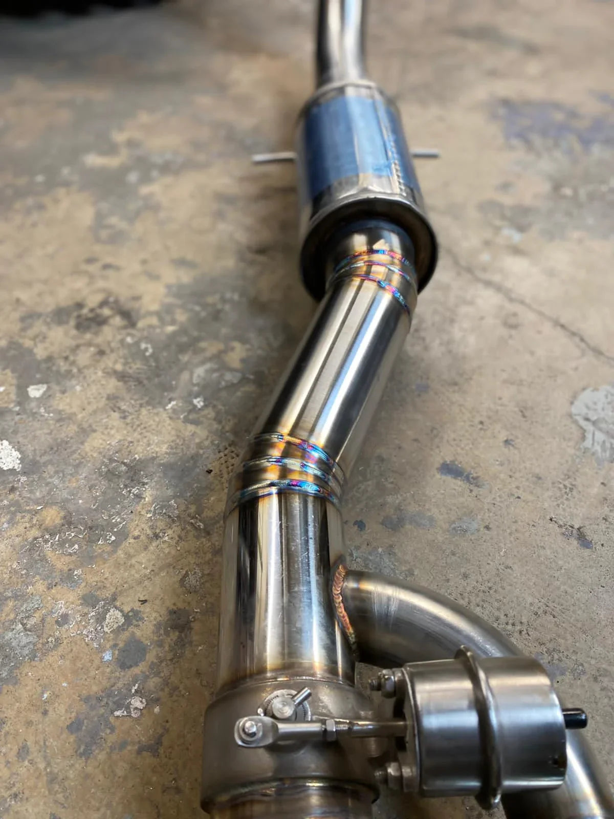 Overland-G diesel exhaust system middle pipe section showing routing and construction