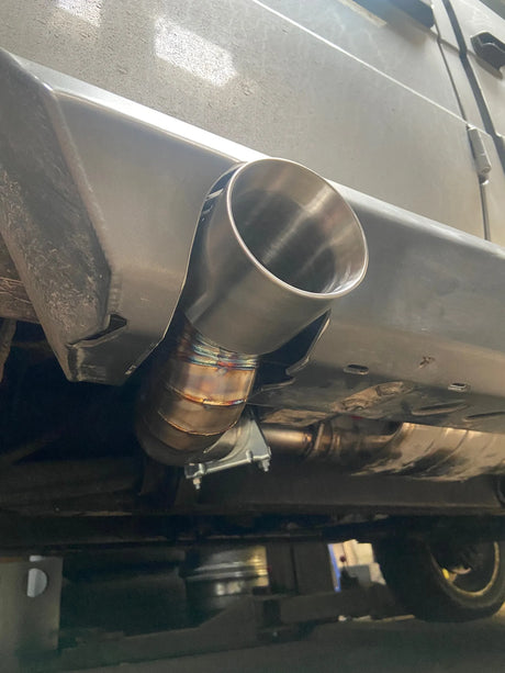 Overland-G diesel exhaust system exit tip integrated through rock slider on G-Class