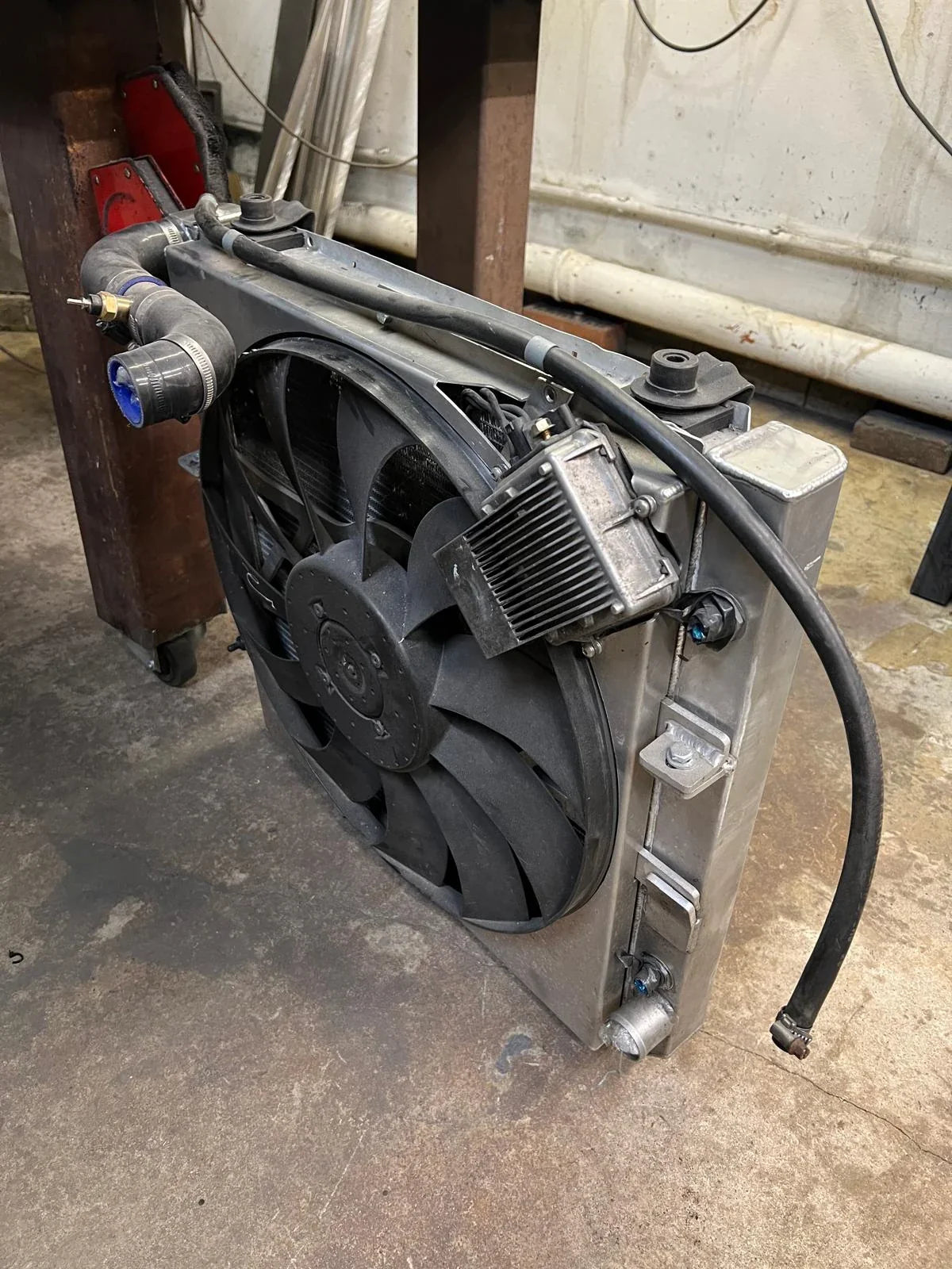 Overland-G expedition cooling kit radiator rear view showing tank and connection points