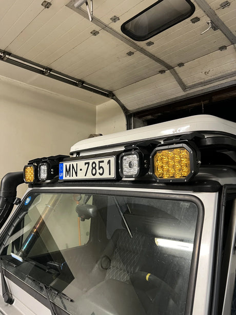 Overland-G expedition roof rack showing Baja light bar and number plate area detail
