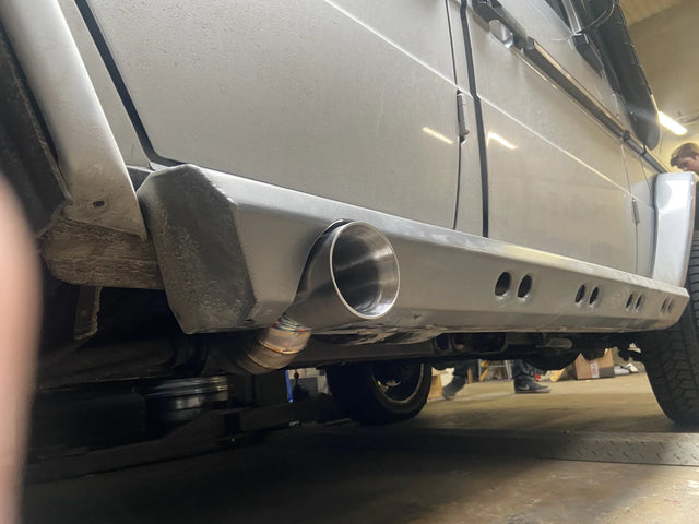 Overland-G heavy duty aluminum rock sliders installed on G-Class showing exhaust integration
