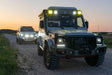 Overland-G perimeter lighting kit front light pods installed on G-Class bumper and body