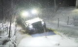 Overland-G perimeter lighting kit active during winter night drive in snow