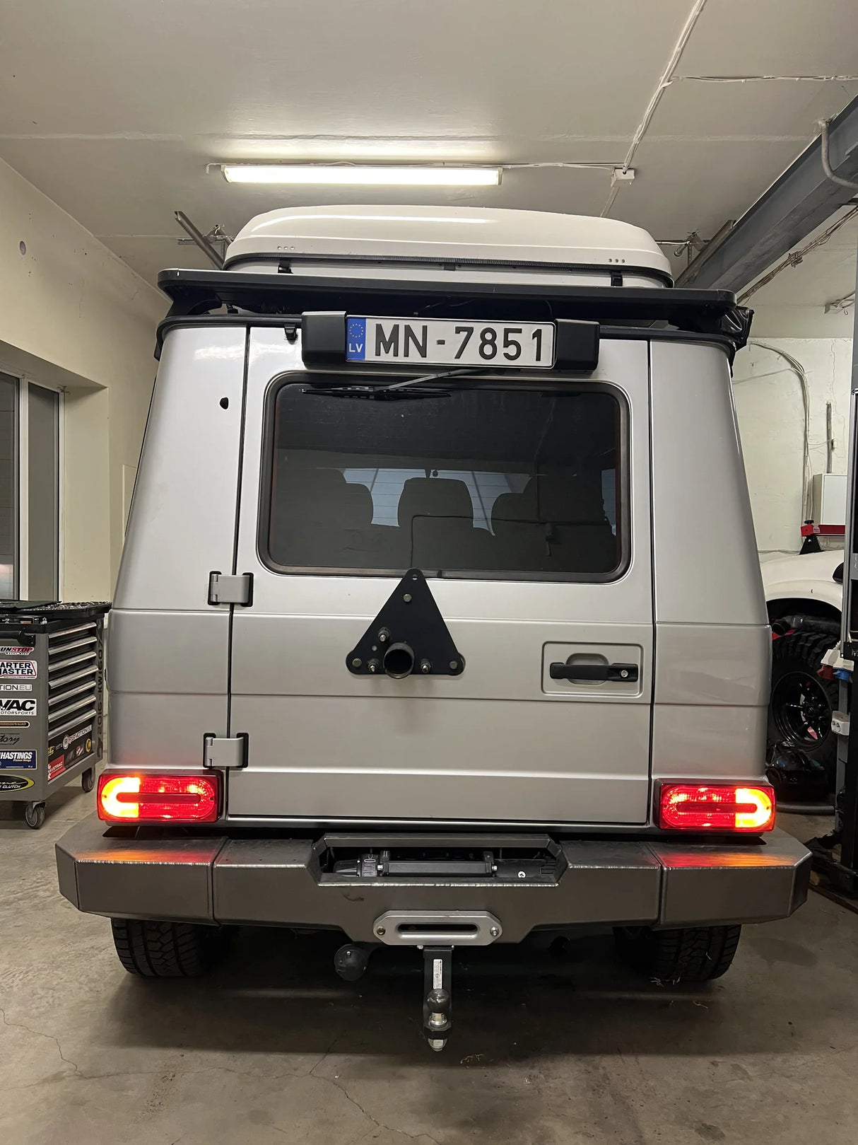 Overland-G rear license plate relocation kit top mount installed
