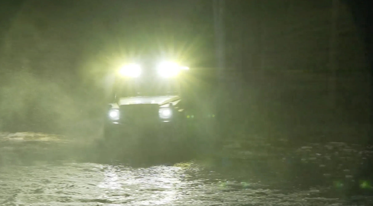 Overland-G roof LED light bar kit illuminated during donuts action showing beam output