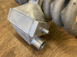 Overland-G water-to-air intercooler kit side profile showing core thickness and inlet outlet