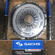 Clutch plate on a cardboard box with Sachs branding