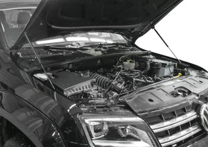 Volkswagen Amarok 2010–2023 hood struts installed mounting close-up